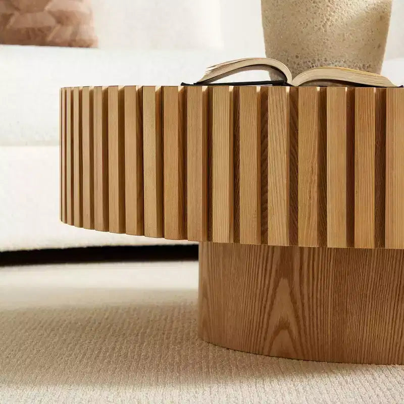 Table basse ronde moderne avec plateau en pierre frittée