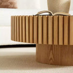 Table basse ronde moderne avec plateau en pierre frittée