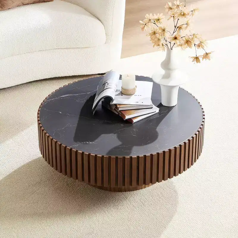 Table basse ronde moderne avec plateau en pierre frittée