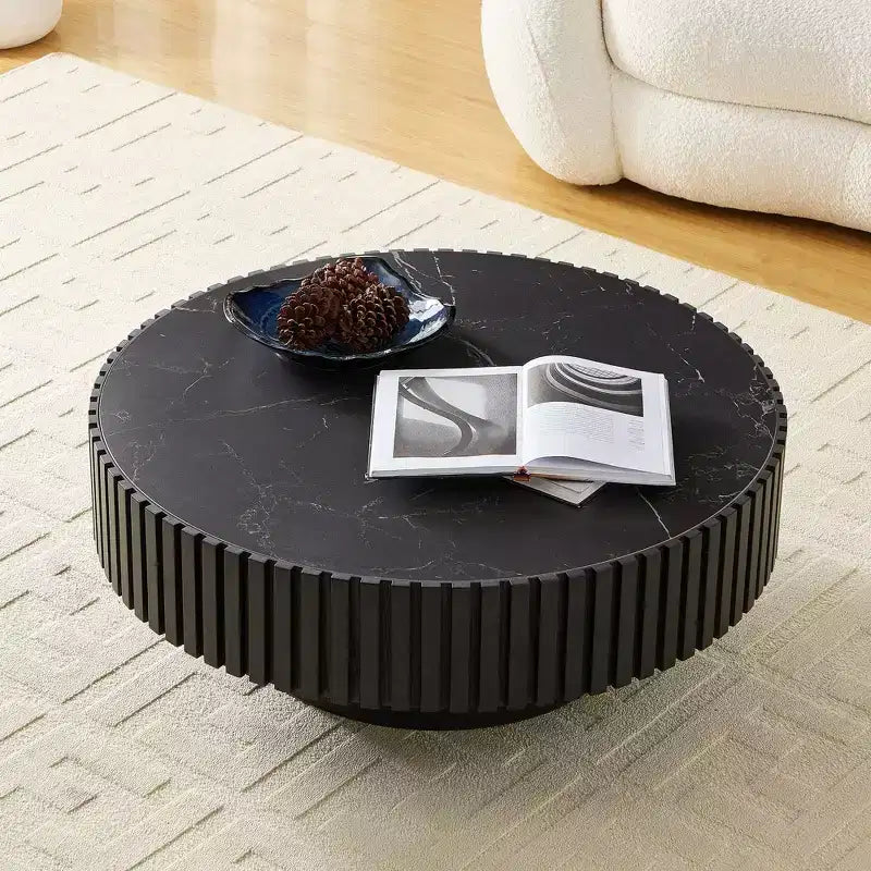 Table basse ronde moderne avec plateau en pierre frittée