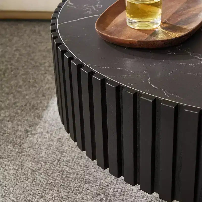 Table basse ronde moderne avec plateau en pierre frittée