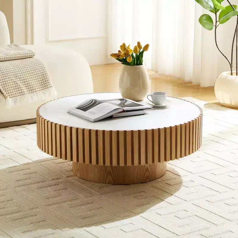 Table basse ronde moderne avec plateau en pierre frittée