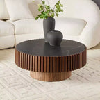 Table basse ronde moderne avec plateau en pierre frittée
