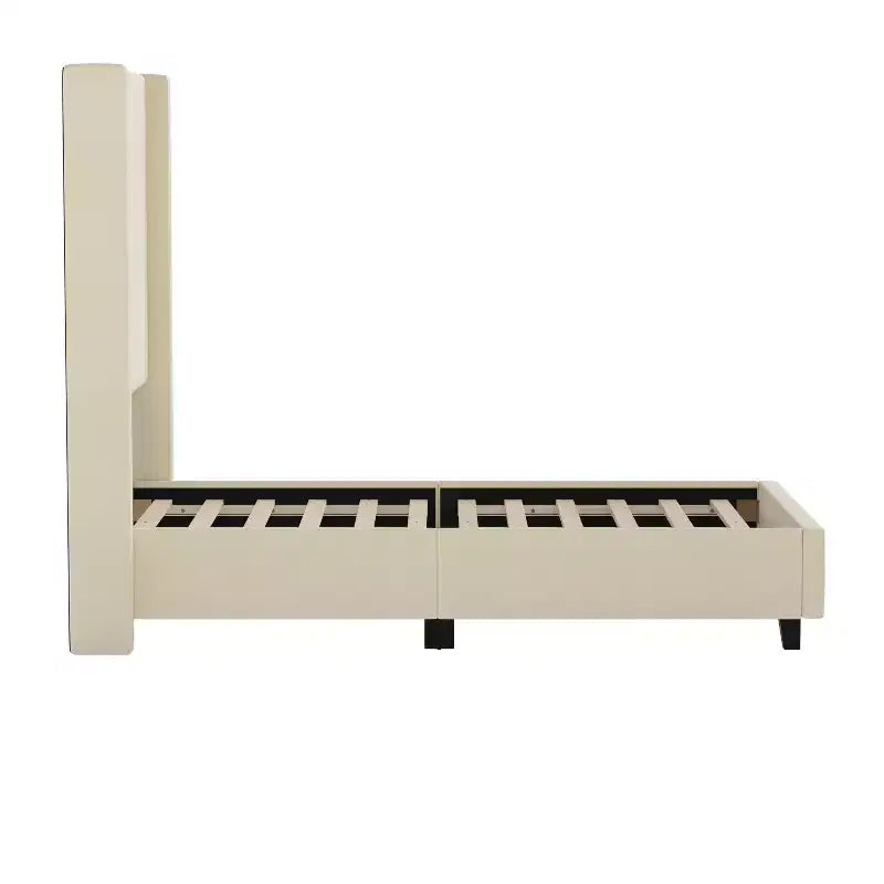 Lit plate-forme capitonné avec tête de lit à dossier ailé et coutures verticales, sommier inclus